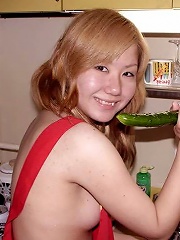 Naughty asian amateur teen puts carrot and cucumber in her tight pussy